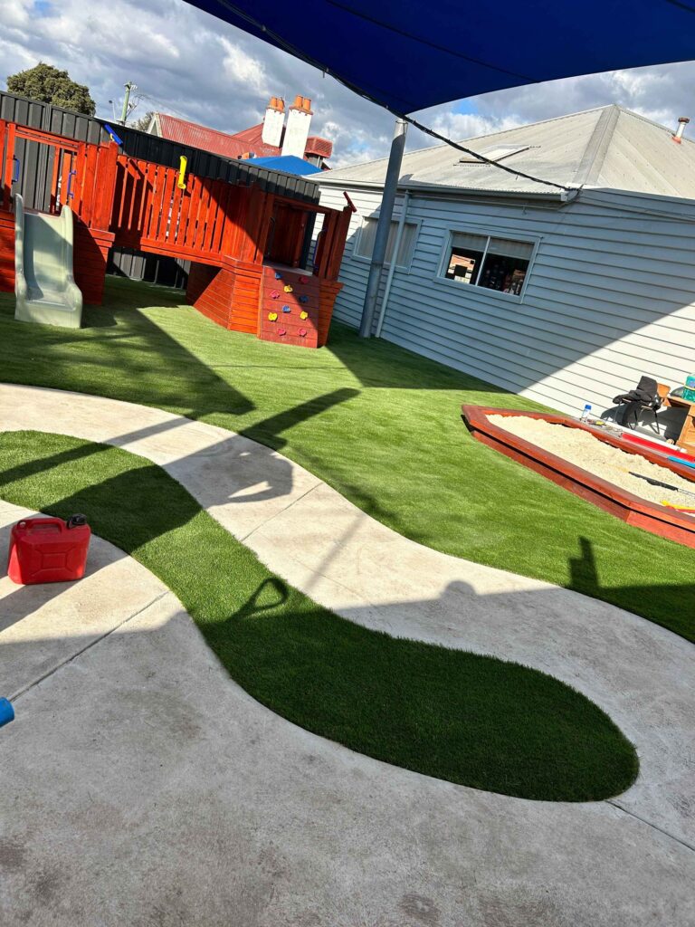Children playing in the outdoor area at Anderson Road Child Care Centre, Albion